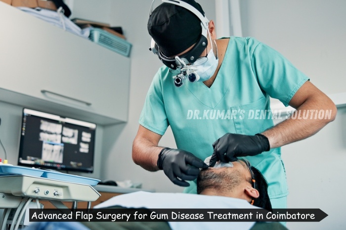 Experienced dentist performing advanced flap surgery for gum disease treatment at Nataraj Dentistry in Coimbatore